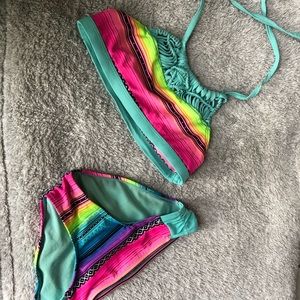 Justice multi-colored swim suit